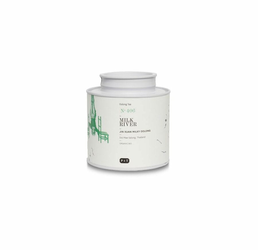 A subtle creamy Oolong tea from Northern Thailand in metal tea bin.